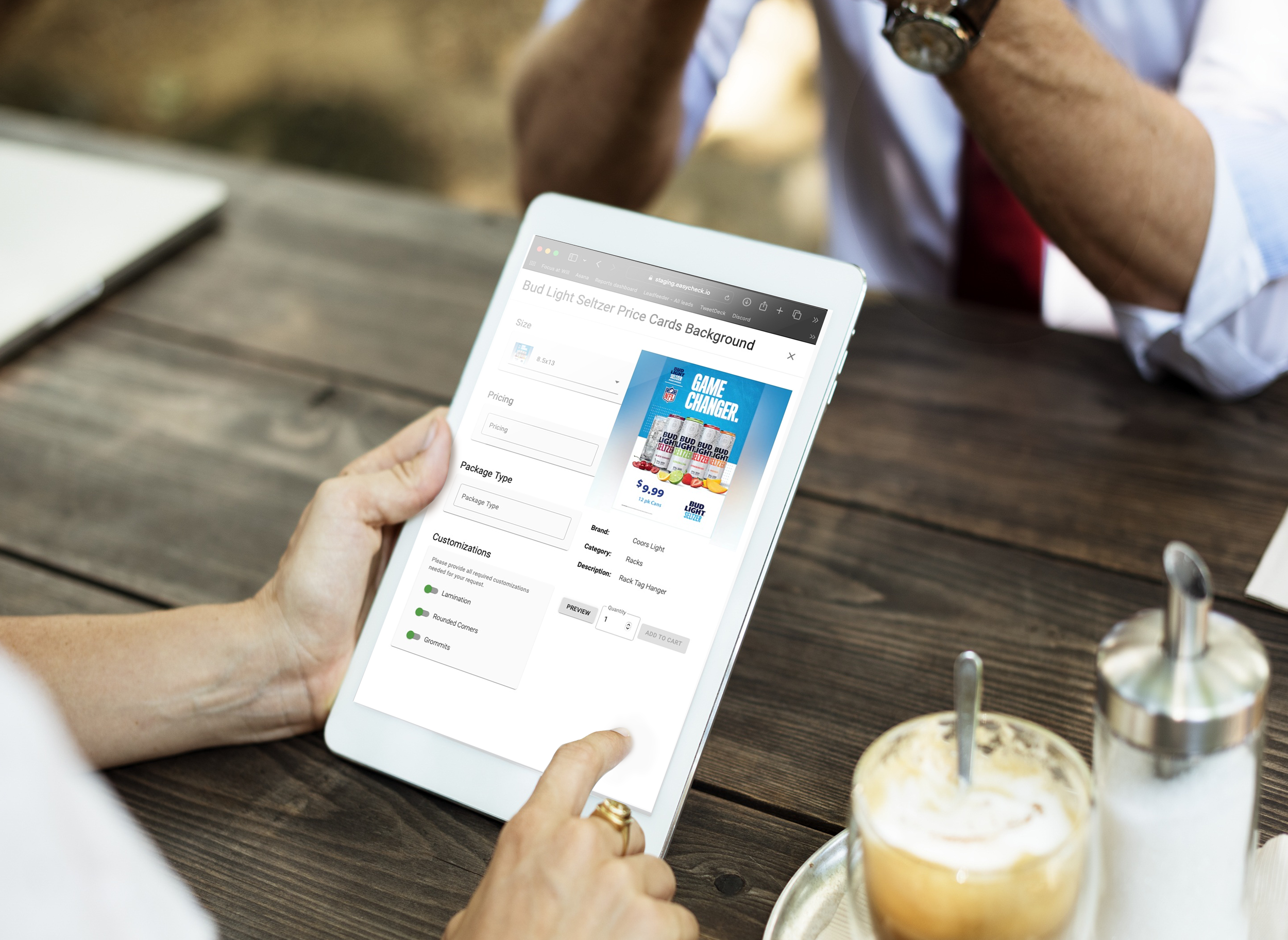 Business professional using iPad for field execution tracking